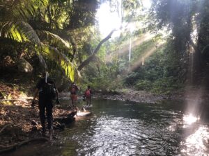 River crossing with the two young Tagbanua guides